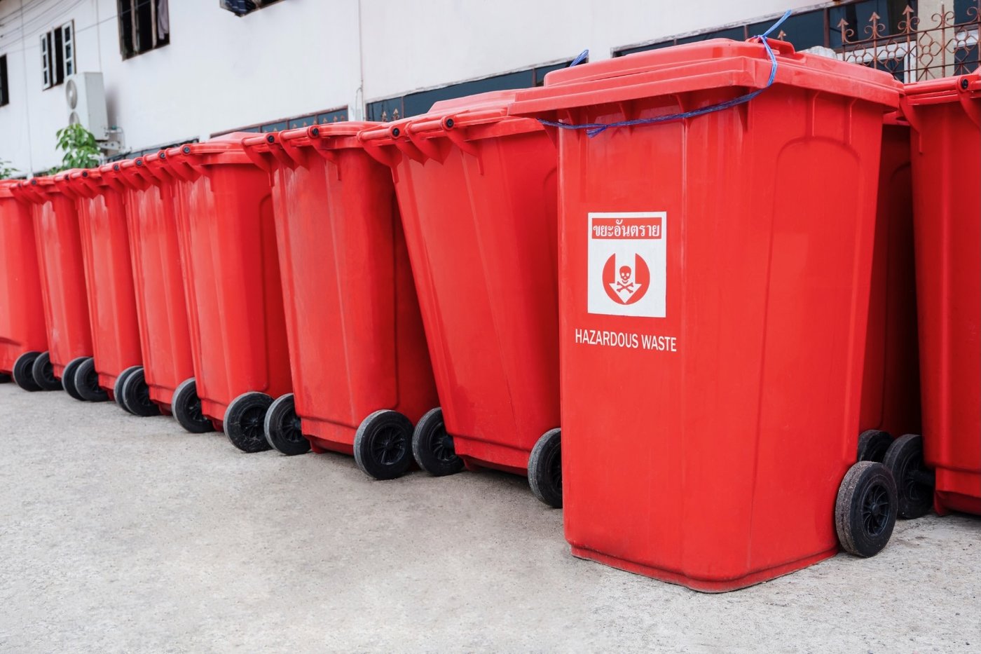 Rows of hazardous waste bins staged for disposal