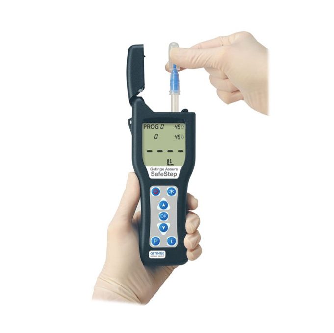 Technician performing an ATP swab clearance test