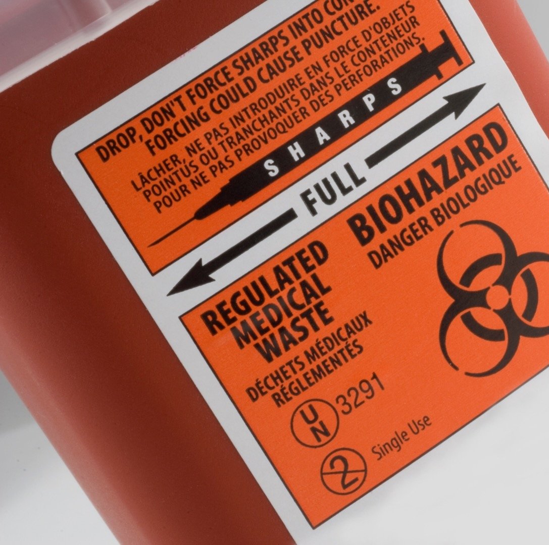 Regulated medical waste, labeled per DOT and biohazard standards